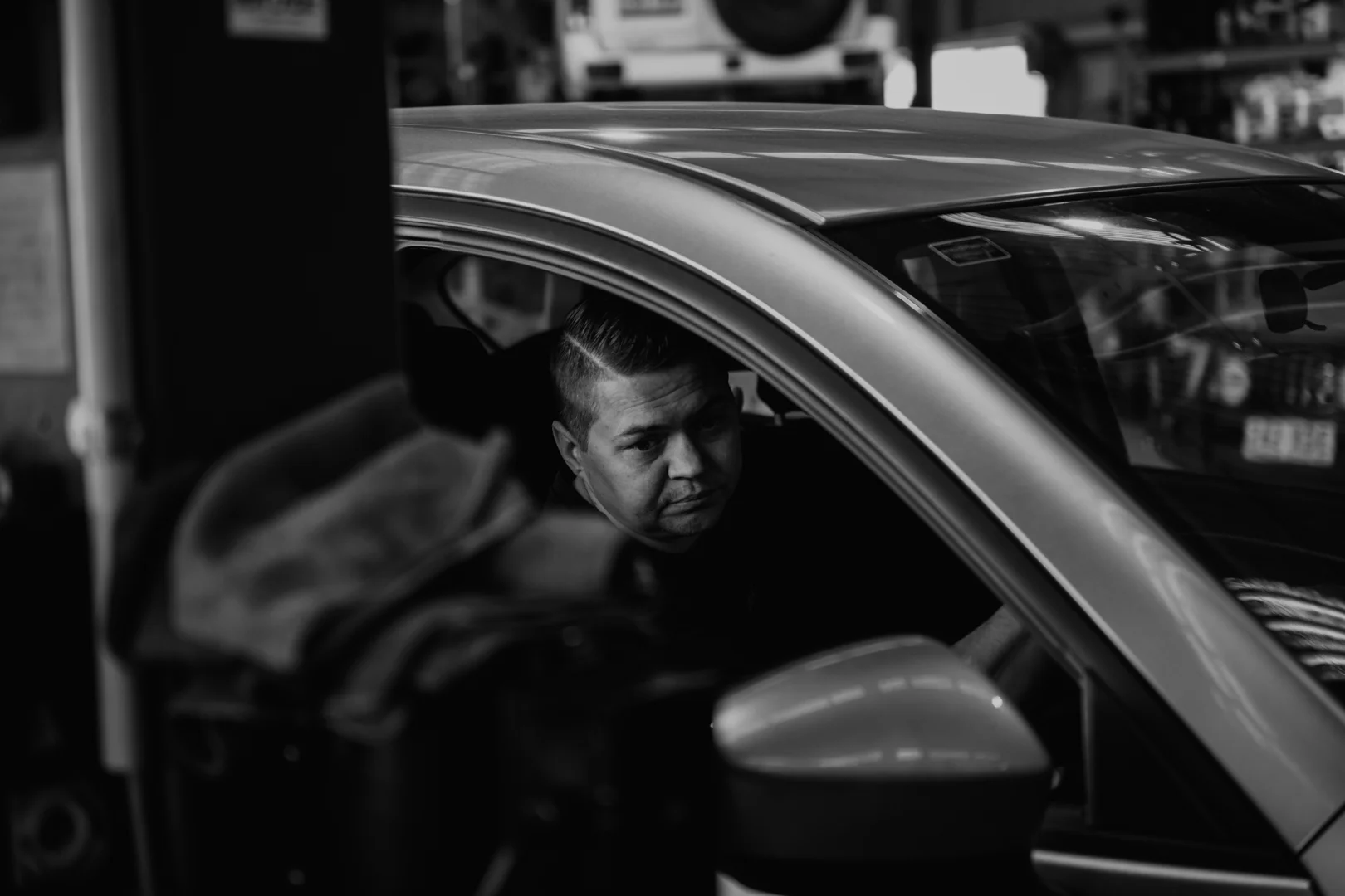 Detailed vehicle inspection inside the Aztech workshop
